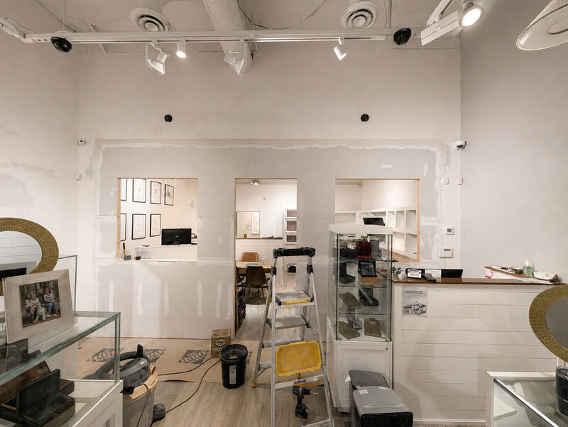 Mid-renovation: patched drywall, raw pass-throughs
