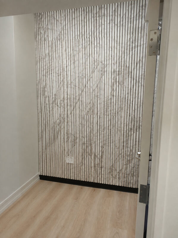 A fluted dowel feature wall going in