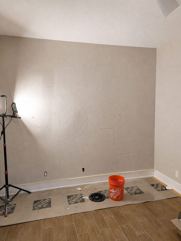 As found: heavy knockdown texture, raked by a work light
