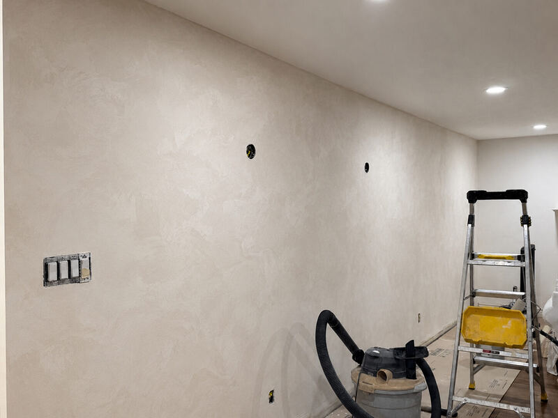 Wall finished, sconce boxes still open, shop vac still in the room